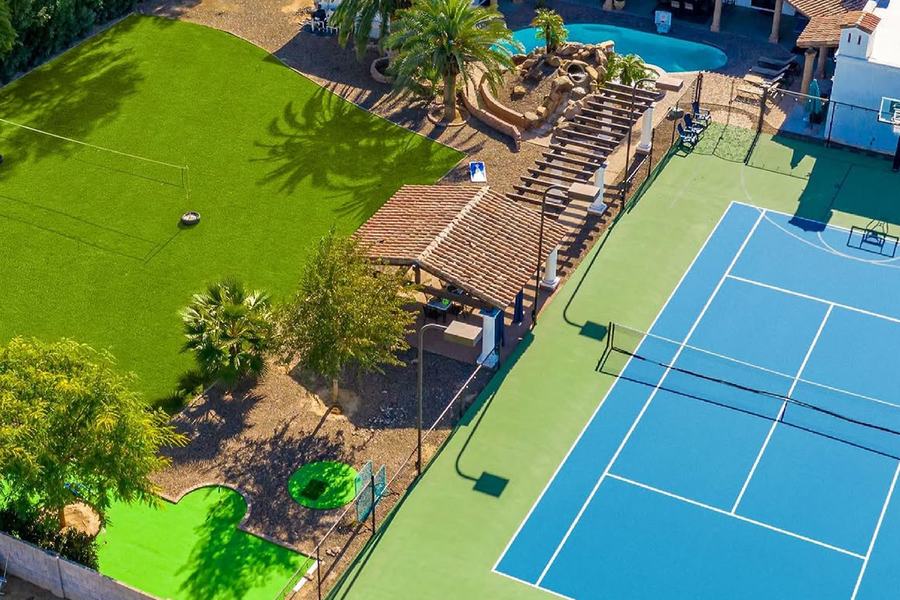 Private pool and shaded patio at a Scottsdale estate, set up for a wellness getaway
