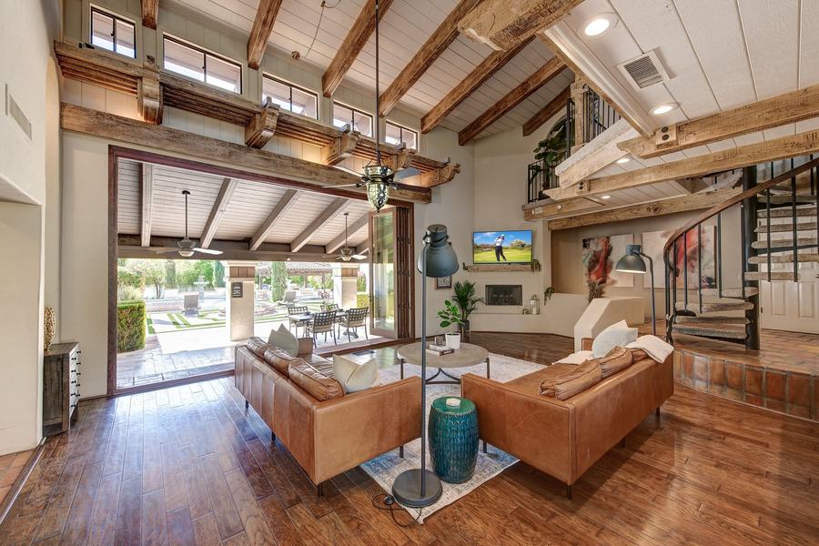 The Living Room with Accordion Doors Open to the Courtyard